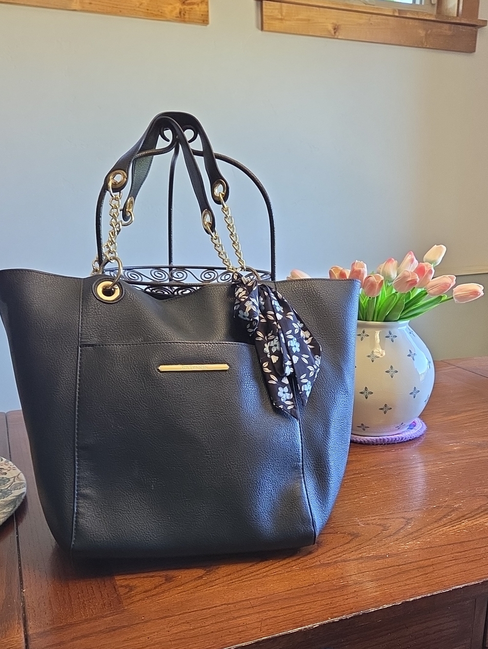 Steve Madden Black Tote with Gold Chain Handles and Floral Scarf Accent
